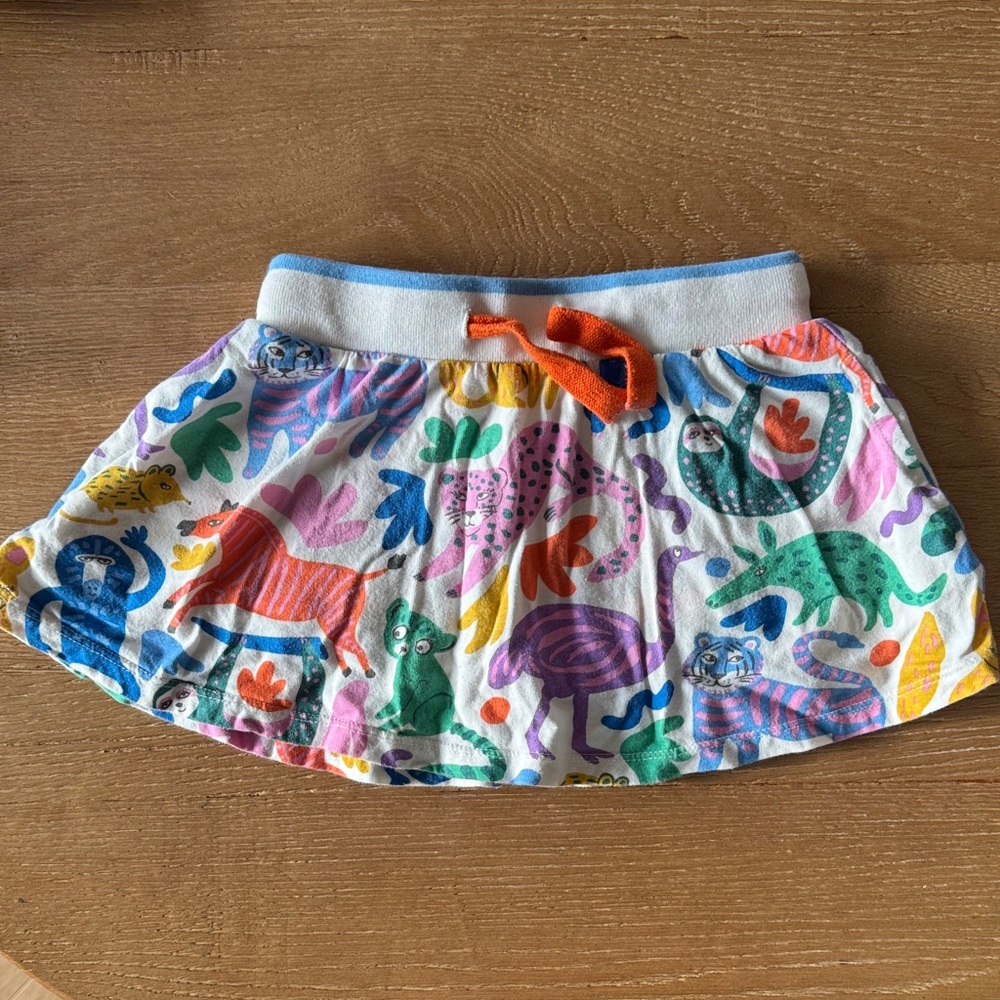 Mini Boden Girls Multicolor Animal Print Skirt with Light Blue Trim, Size 3-4Y